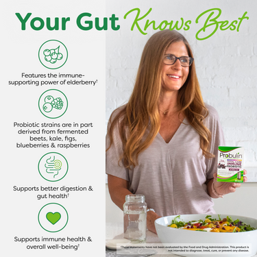 A woman holding Total Care Immune, showcasing how a daily probiotic supports the gut-immune connection and overall well-being.
